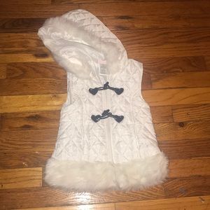 White fur lined vest